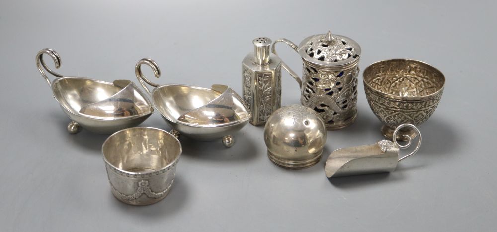 A pair of George V silver salts, a Chinese white metal mustard pot pierced with dragon and clouds, 6.5cm, a pepperette, a caddy spoon s